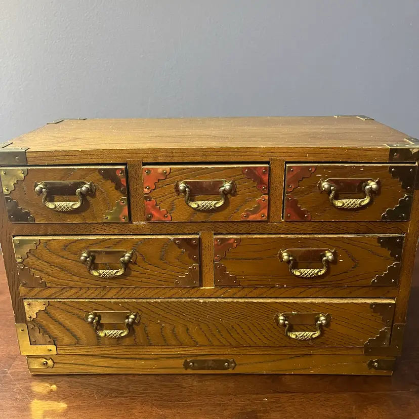 Vintage Asian-style multi-drawer wooden jewelry chest  And Music Box with brass and copper fittings.
13x8x6.5”
