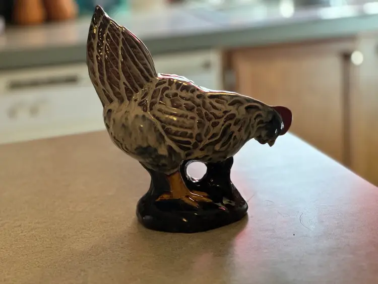 Vintage Ceramic figurine of a hen. 9 Inches
