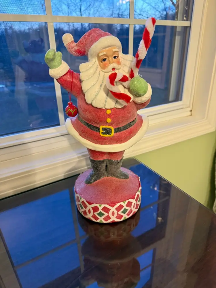 vintage Santa/St. Nick figurine holding candy, canes & ornament; resin/colorful