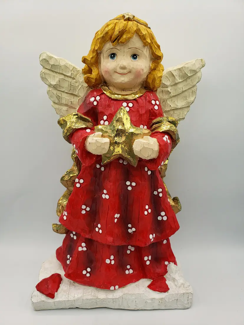 Vintage Angel Holding Star Figurine 14” Holiday Christmas Decor Wood Carved Look. This rare item was made in the late 1990's. It stands about 14" tall, 9" wide and 4.5" deep.