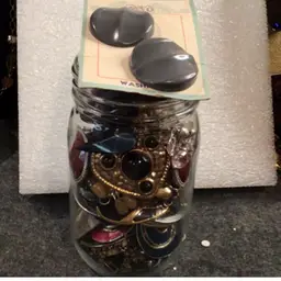 Jar of earrings, etc.