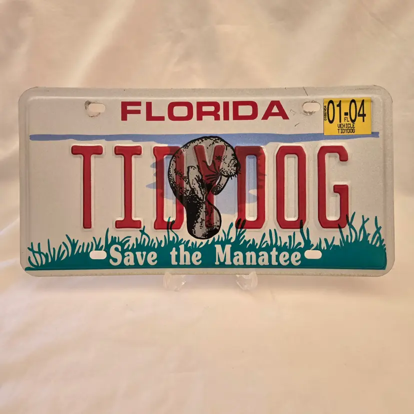 Florida Manatee Specialized License Plate "TIDY DOG" Vintage Tag 01/04 with Condition Issues