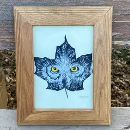 Original Owl Face Painting On Leaf. Artist: Tom van Hees. Wooden Frame With Sawtooth Hanger On Back. Frame Opening: 6 9/16”h x 4 9/16”. Frame: 9 9/16”h x 7 9/16. Artist Signed.