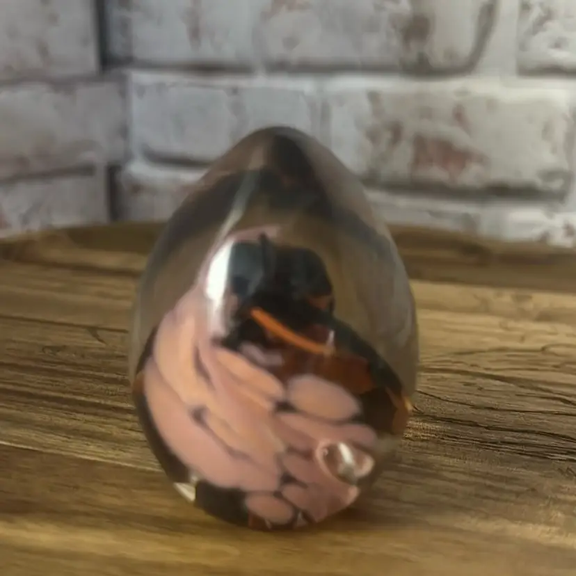 under 20 dollars 2.5” Egg-shaped Paperweight With Pink & Black & Orange Swirls