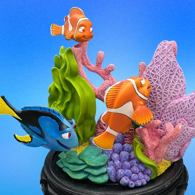Disney Finding Nemo and Friends coral reef figurine with Nemo, Marlin, and Dory.