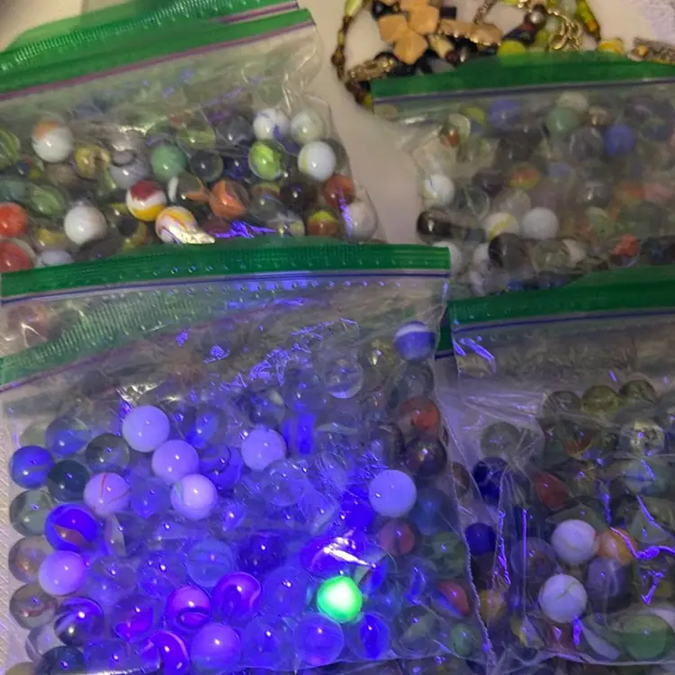 One Bag Of Marbles With One UV Reactive Marble!