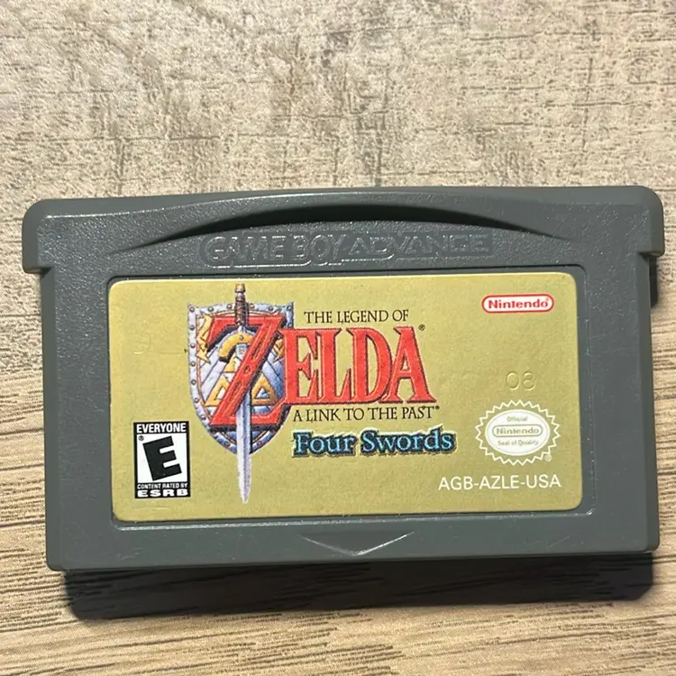 The Legend of Zelda: A Link to the Past and Four Swords video game cartridge for the Nintendo Game Boy Advance.