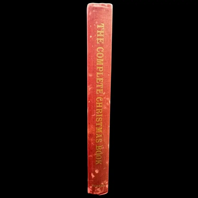 #263B Vintage Hard Cover ‘The Complete Christmas Book’ 
Published By Franklin Watts, Illustrated By William Ronin
Second Printing 1961 
Stories, Poems, Recipes, Craft And Entertaining Ideas
Lots Of Graphics In Red And Black