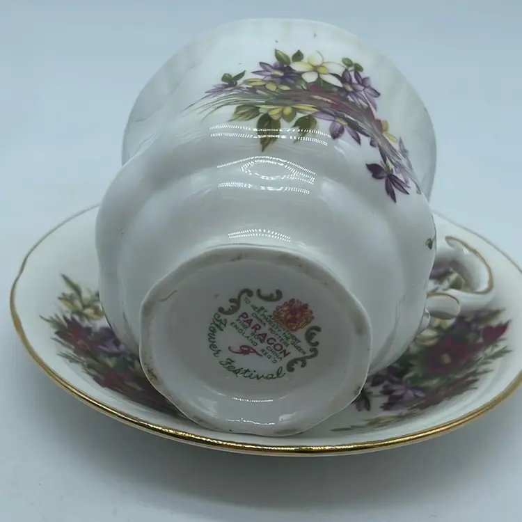 #1061 Paragon "Flower Festival" fine bone china teacup and saucer set.
