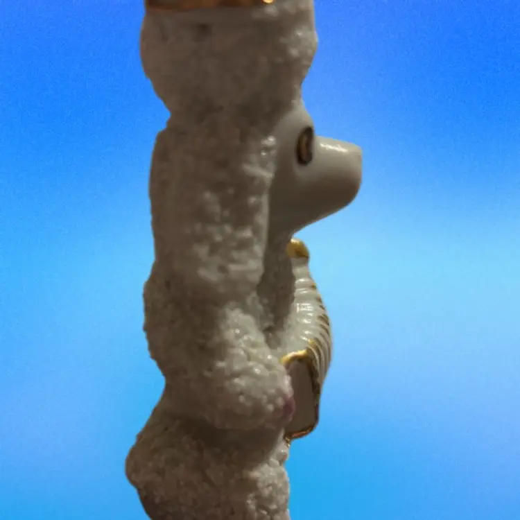 White Spaghetti Porcelain Poodle Figurine Playing Accordion