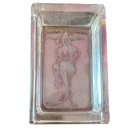 This is a Vintage Tiffany & Co. crystal ashtray or paperweight featuring an etched Joker design