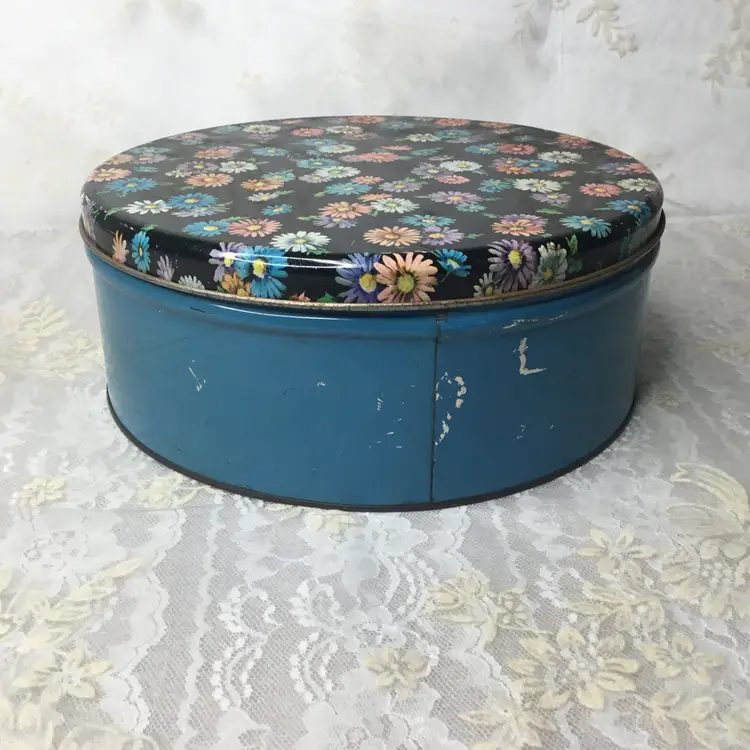 Vintage Collectible Circular Metal Tin Colorful Daisies Sewing Tin Container