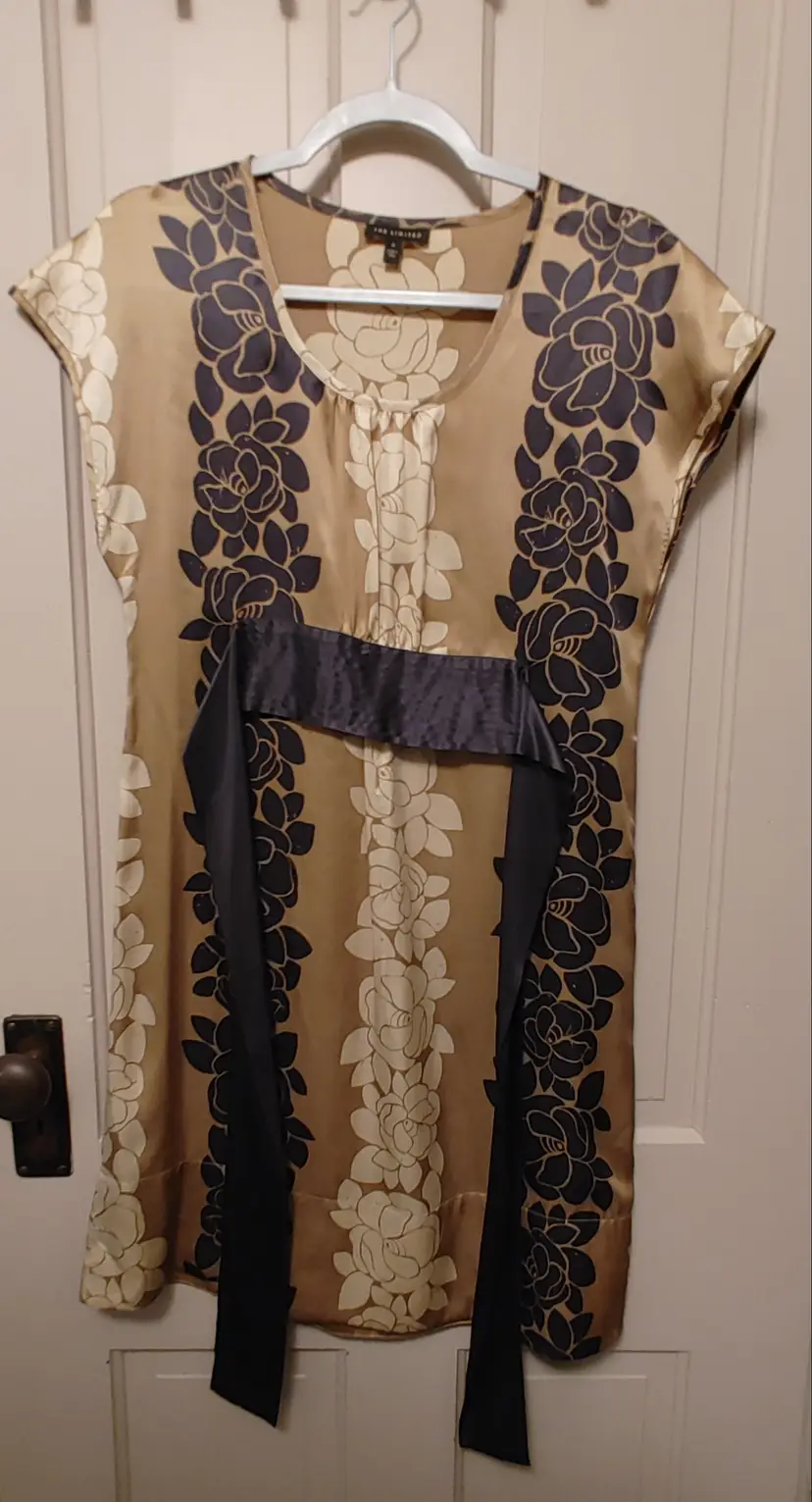 Dress- Brand: The Limited. Size 0. Gold dress with black flowers. Material: 100% silk. No callouts.