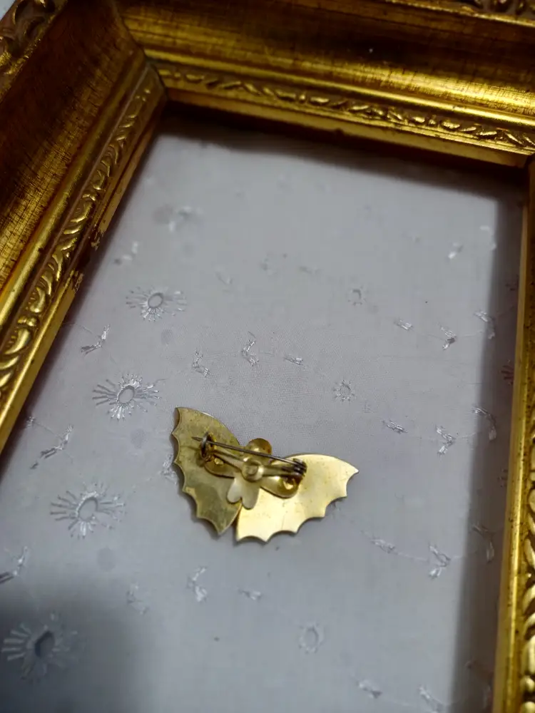 Vintage mother of pearl butterfly brooch