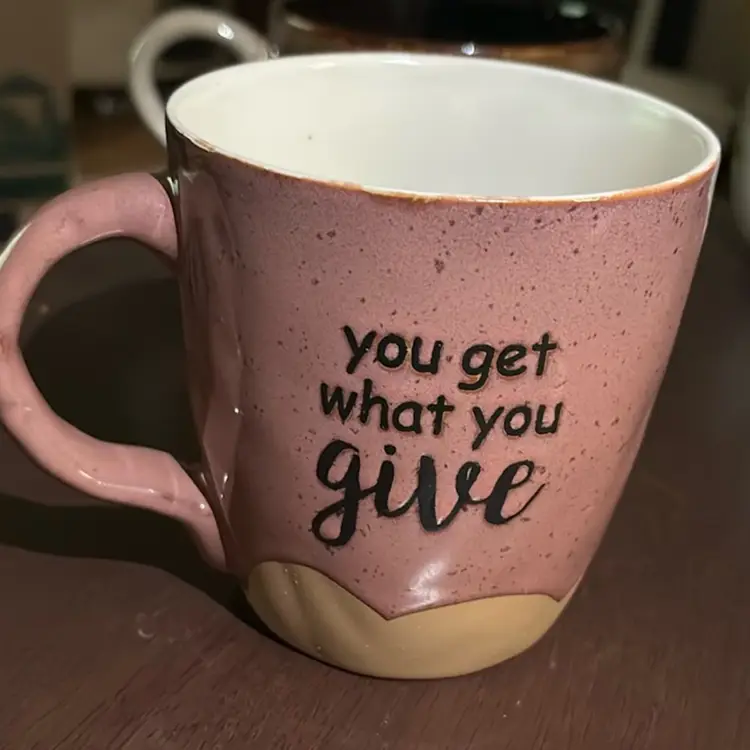 Beautiful Pink And Tan Mug With Chocolate Brown Writing Reminding Us - You Get What You Give
