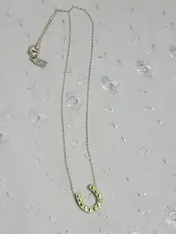 1928 silvertone and green rhinestone horseshoe necklace and pendant