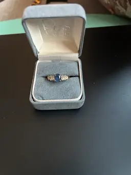 Elegant ring size 7 faux blue stone and little faux zirconias