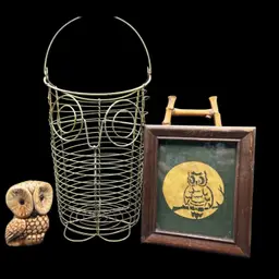 Vignette #3 Whoooo Do You See
Includes Gold Tone Wire Owl Shaped Basket With Handle, Adorable Ceramic Owl Figurine And A Vintage Owl Paper Cut Silhouette Framed Picture