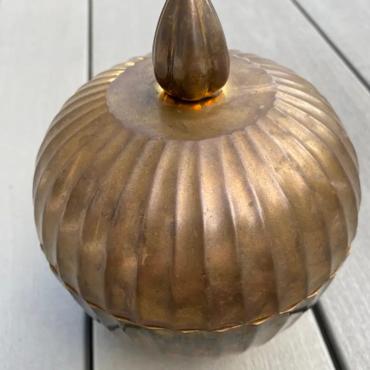 SOLID BRASS CACHEPOT, FLUTED LIDDED BOWL, OR URN WITH A FLAME FINIAL HANDLE