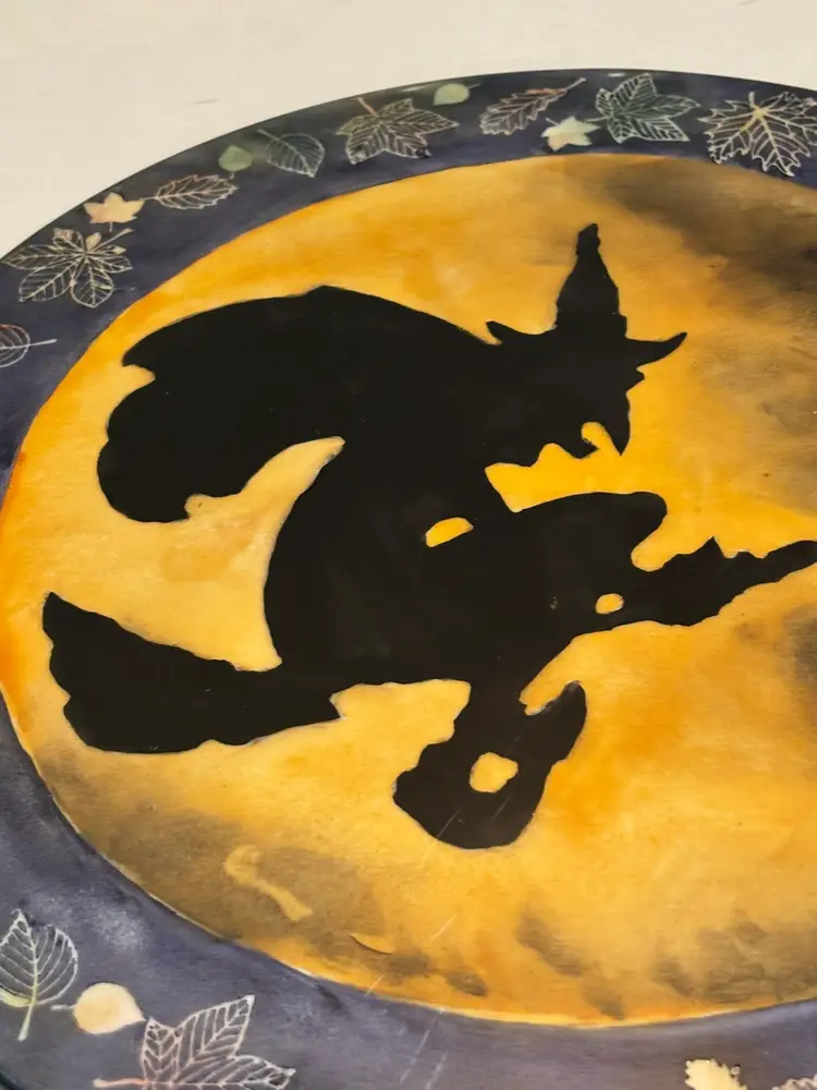 Vintage Ceramic Halloween Plate featuring Flying Witch and Cat 12.5 in. Across