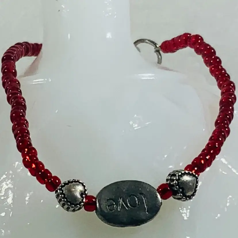 Vintage Costume Jewelry Beaded Bracelet In Red And Silver Glass And Acrylic Beads With Love Charm