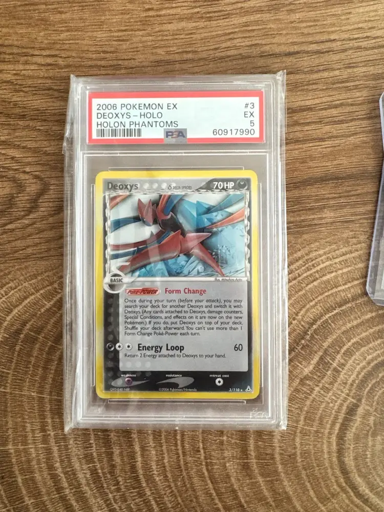 PSA graded Pokémon card lot Deoxys- halo with victini and inteleonVmax in case