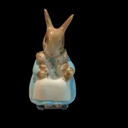 Vintage 1976 Beatrix Potter ~ Mrs. Rabbit & Her Bunnies Figurine. Bone China Hand painted With Glossy Finish. Made In Beswick England . Highly Collectable Item. Beautiful Condition.