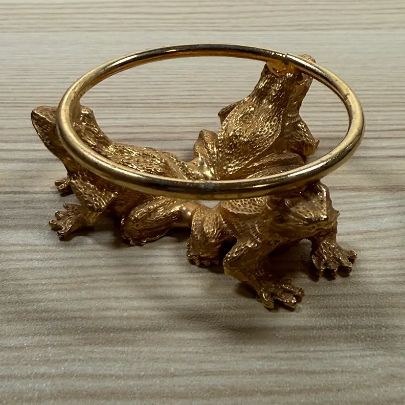 19. Gold Tone Frog Base Paperweight Stand