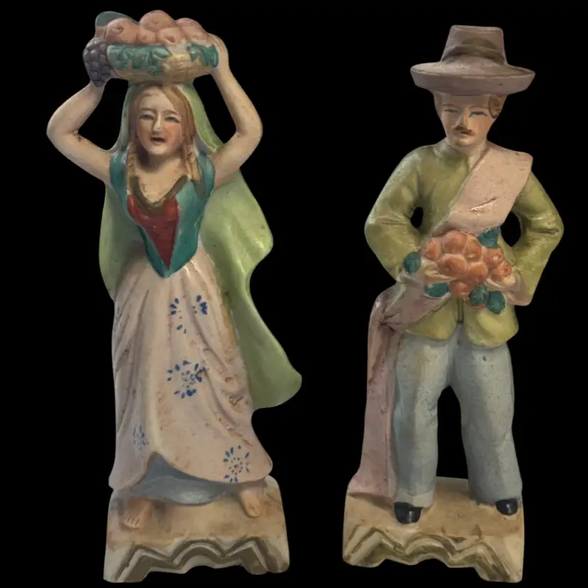 Vintage Pair of Occupied Japan bisque porcelain peasant figurines.
