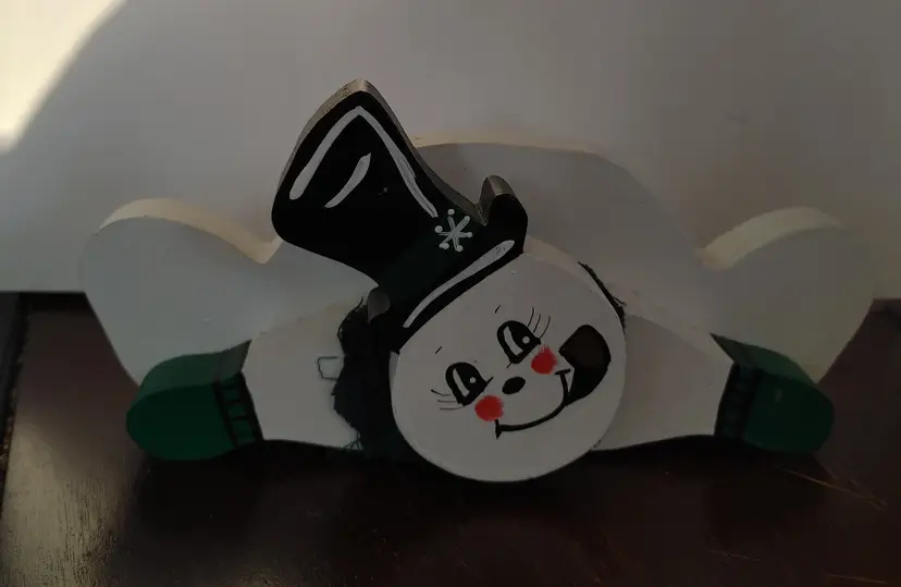 Winter: Wood snowman decoration. 9 inches long.