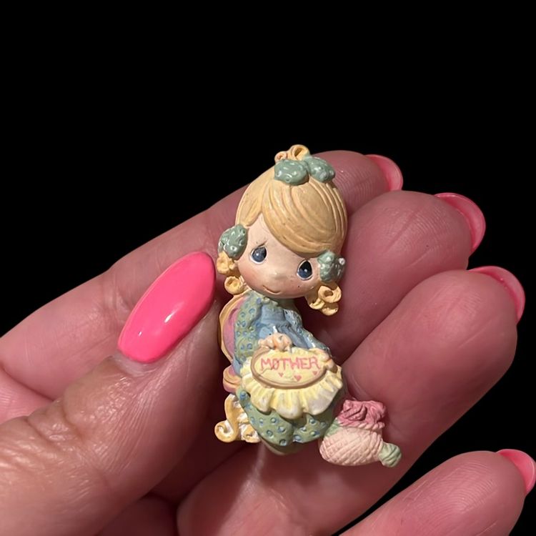 59. Precious Moments Resin Mother Brooch