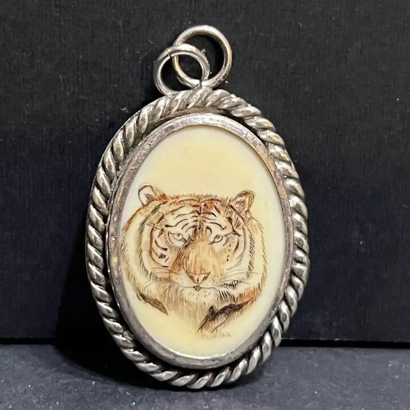 1977 Scrimshaw Tiger Pendant Silver Plated Brass, Signed ~1.5” x 1"