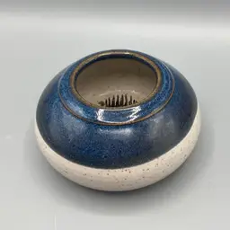 Blue and Cream Pottery Flower Frog Signed