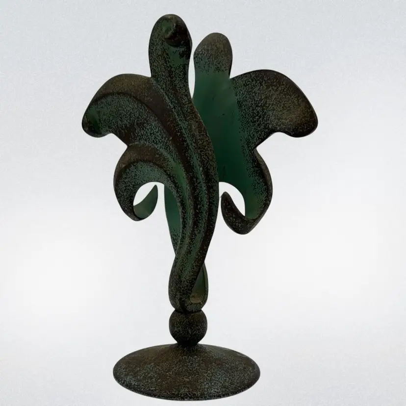 Art deco metal sculpture has lots of patina