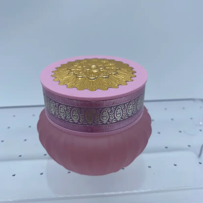 #4215 Vintage Avon Elusive Cream Sachet jar with a decorative lid.