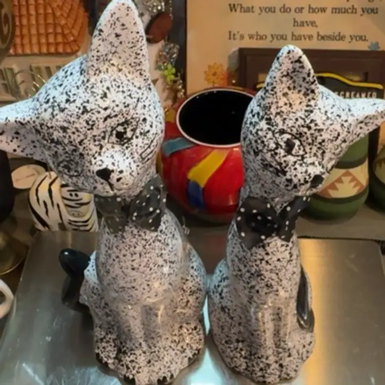 Speckled Pair Of Cats