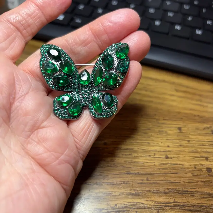 Butterfly Approach Silvertone With Emerald Stones