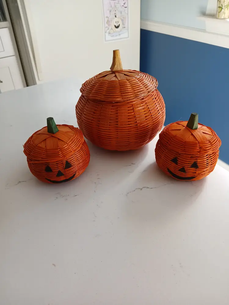 Vintage Halloween Jack o Lantern Pumpkins and one large basket, all made from wicker
