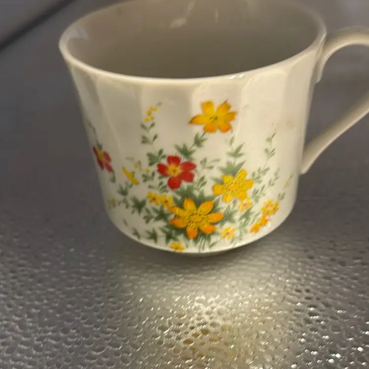 Vintage Tea Cup With A Pretty Springtime Floral Design