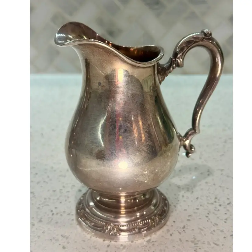 Vintage 6” tall 5” wide silver-plated creamer or small pitcher, in Remembrance pattern, 1847 Rogers Bros.