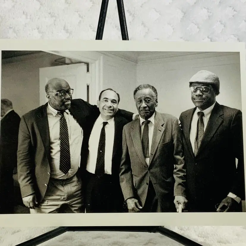 Vintage Postcard Black Writers
PHOTOGRAPHS BY JILL KREMENTZ
STANLEY CROUCH, LEON FORREST, ALBERT MURRAY, and JAMES ALAN MCPHERSON, New York, N.Y., May 26, 1994
The influential writers Stanley Crouch (b. 1945), Leon Forrest (b. 1937), Albert Murray (b. 1916), and James Alan McPherson (b. 1943) are pictured here paying homage to a mentor and generous friend, Ralph Ellison, following a memorial service at the American Academy of Arts and Letters.
POMEGRANATE