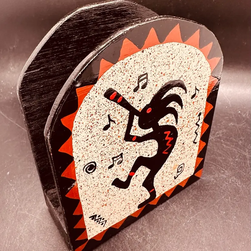 390. Napkin Holder featuring a hand-painted Kokopelli.