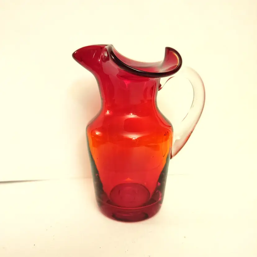 Amberina art glass pitcher. Pontil mark. 5 high.