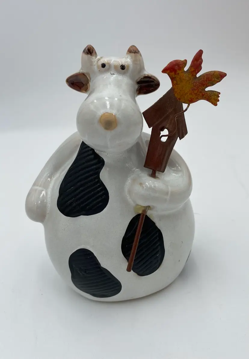 Ceramic Black & White Cow Figurine holding Metal Bird House w/Bird Figurine