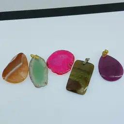 Five Sliced and Polished Gemstone Pendants