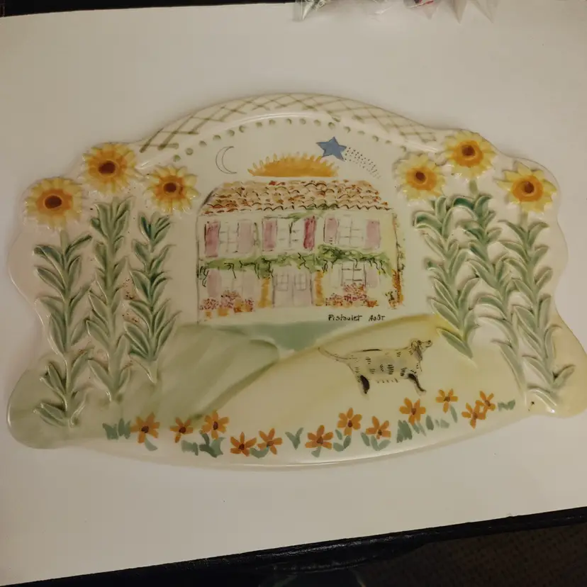 The Secrets of Pistoulet trivet by Jane Kolpen. Pfaltzgraff. Made in Mexico. Hand painted French country scene. No chips or cracks.