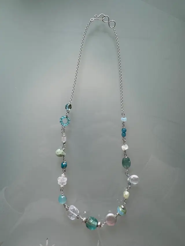 #27 Beach Blues Whites And Crystal Color Gemstones Of Multiple Shapes Necklace Wired Together On Sterling Silver chain And Infinity Handmade Clasp 17 1/2”