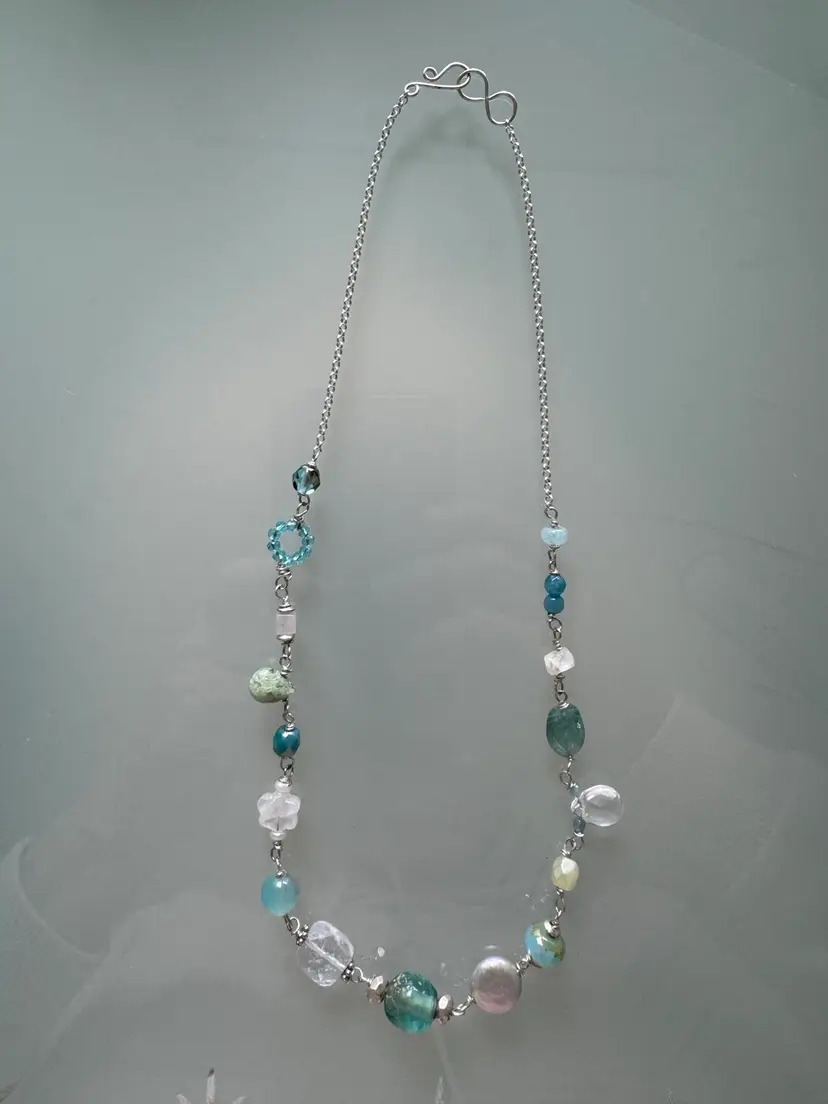 #27 Beach Blues Whites And Crystal Color Gemstones Of Multiple Shapes Necklace Wired Together On Sterling Silver chain And Infinity Handmade Clasp 17 1/2”