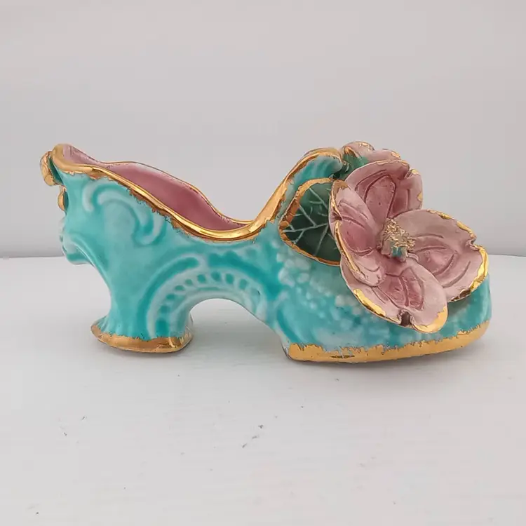 Antique porcelain shoe with flowers