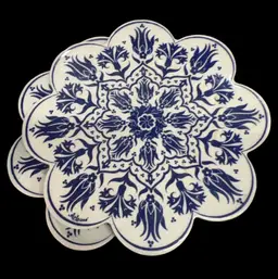Set Of Two Matching hand-painted Turkish ceramic trivet with a blue and white floral pattern.